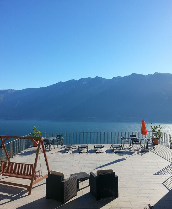 Panoramic lake view terrace with relaxation area